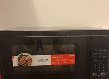 microwave used but new