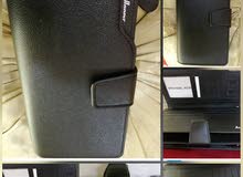 محفظه رجاليه جلديه بني واسود محفظه رجاليه جلديه بني واسود