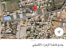 نص هكتار للبيع في الكحيلي بالقرب من جامع فاطمة الدهراء الموقع في الوصف