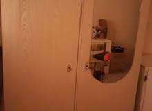2 door wooden cupboard with mirror