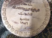 مادليه مطلي ذهب قديمه اثريه من عام 1986السعر1000دولار