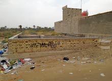 قطعة ارض مع بناء بتلو   (صاحب الارض عراقي)