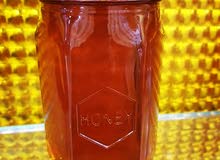 الملكة للعسل الفاخر الطبيعي عسل مضمون 100% معالج للأمراض
