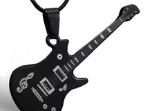 Guitar necklace قلادة القيتار Guitar necklace قلادة القيتار
