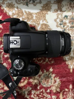 كاميرا كانون 2000D  عدسة كانون 85mm 1:1.8  فلاش TT685