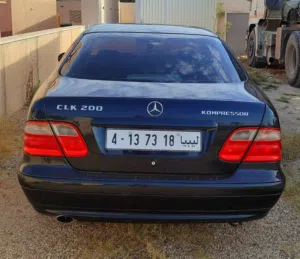محرك كمبرسر الاحمر clk 2002