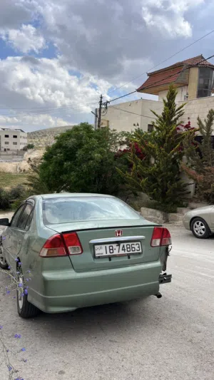 هوندا سيفيك 2004 للبيع قير توماتيك السياره ميه الميه امورها تمام بس تهرب زيت باوار