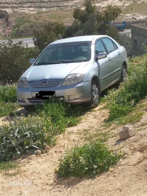 تويوتا كورولاموديل 2003خصوصي اصلي السيارة دهان جديد ترخيص جديد لاشهر 3 متور1008بيان