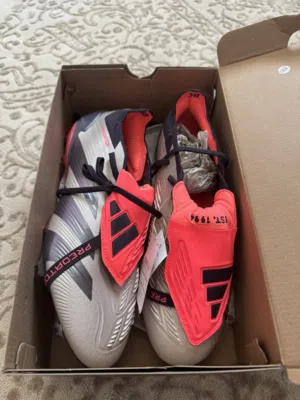 New unused football boots with receipt