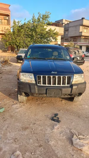 جيب جراند شيروكي محرك 4.0 رباعية 2004 بيع او افاري
