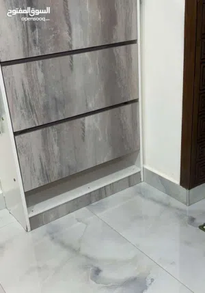 طاولة احذيه