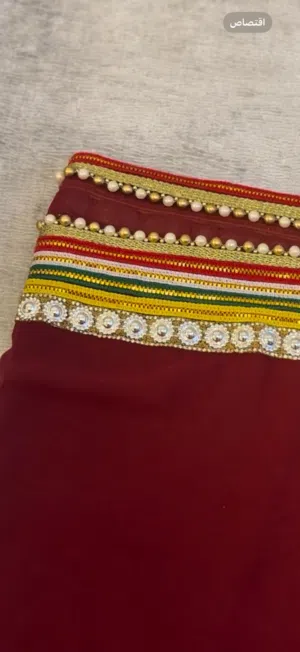 لبس عماني طويل مطور