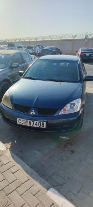 لانسر 2007 خليجي ماكينه 1.6 تكيف شغال شاشه
