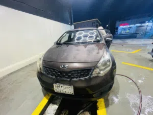Kio 2014 sedan manual Brown cour