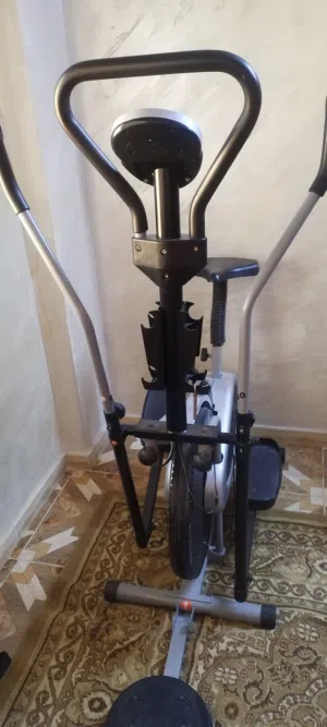 جهاز كروس رياضه مع دامبلز