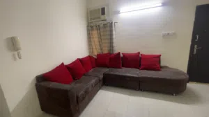 Comfortable L-Shaped Corner Sofa with 8 Red Cushions
