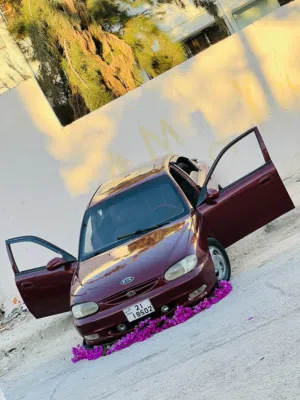 كيا سيفيا تو لون خمري مميز للبيع بسعر مناسب