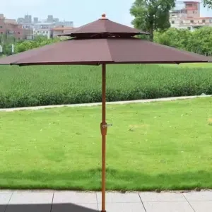 outdoor central column patio umbrella with a center pole and a white base.