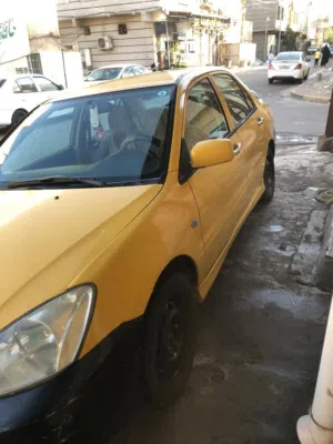 لانسر 2009 للبيع السيارة بأسمي رقم كربلاء لانسر 2009 بيع او مراوس بخصوصي وانطي فرق السيارة خليجي
