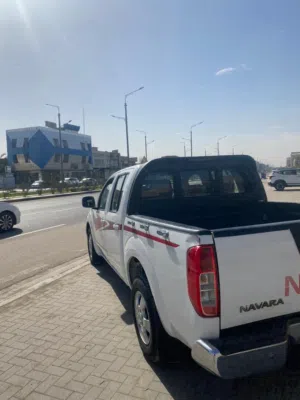 سلام عليكم نيفارا مديل 13 مكفوله من صبغ وبيه طخات خفيفه شوف لعين تبريد شغال ما ناقصه اي حبه حداده نص