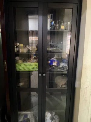 Two Glass Door Cabinet in Brown Color