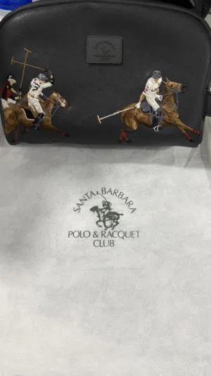 شنطة بولو شبه يديدة نظيفة ويا الچيسة مالتها