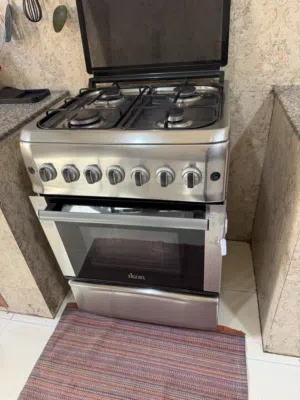 Urgent selling fridge 60omr Dinning table 20omr Stove 50omr