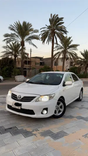 تيوتا toyota كورلا Corolla 2013 خليجي محرك 1600 للبيع لون ابيض مكفولة  بغداد / الاعظمية