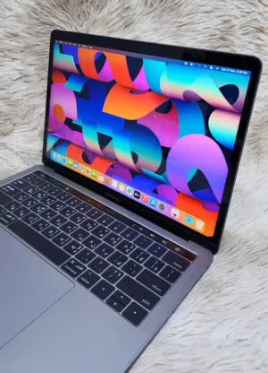 MacBook Pro with 1tb ssd i7 16gb ram 4type C ports iris plus Graphics Touch Bar &I'D Built-in retina