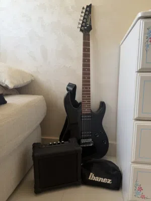 Ibanez Black Electric Guitar with amp and gig bag.