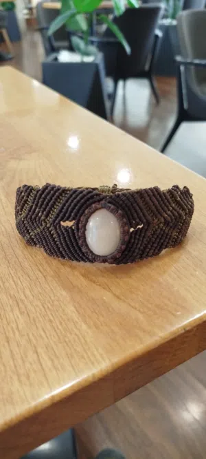 Handmade macrame pieces. Some pieces feature natural stones such as jade, quartz,  tiger's and More.