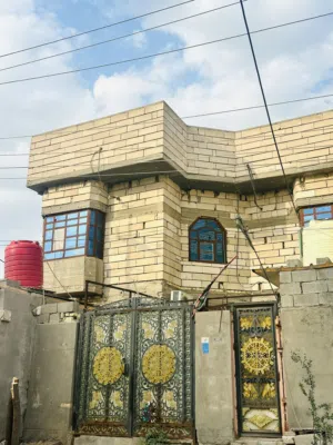 بيت حي الاصدقاء تقاطع العسكري مقابل ياسين خريبط  خلف قاعه اعراس رومانتك امام مدارس الفضل الاهليه