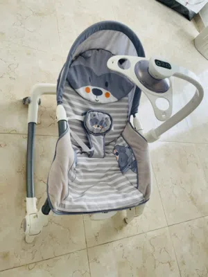 كرسي بيبي ثابت و هزاز مع تعليقة للألعاب