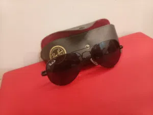 نظارات RayBan عدد 2 الذهبي والأسود. إيطالي وشرط أصلي مو درجه اوله مقاس 58