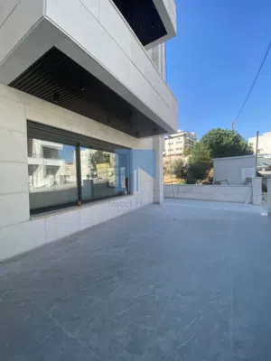 شقة أرضية فاخرة للبيع في خلدا - خلف ميداس 160م مع ترسات 120م تشطيب سوبر ديلوكس لم تسكن