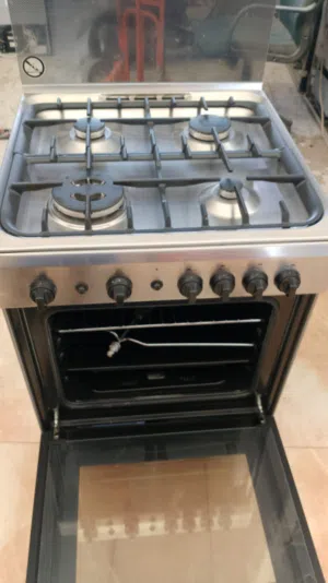 Indesit 4-Burner Freestanding Gas Cooker with Oven  Stainless Steel  Excellent Condition