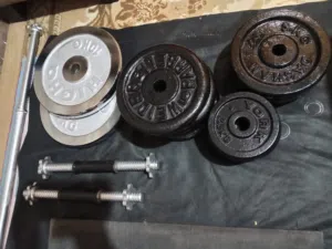 2 طارات كروم 10 kg و دمبل ذكي 80 كيلو و بنش و حديد و بار و دمبلز