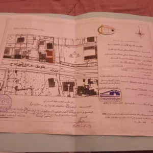 حوش مساحته 840 في تلات محلات وجهتين  سعر يا بلاش