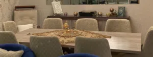 طاولة سفرة بحالة جيدة مع كرسي هزاز وخزانة دنسوار