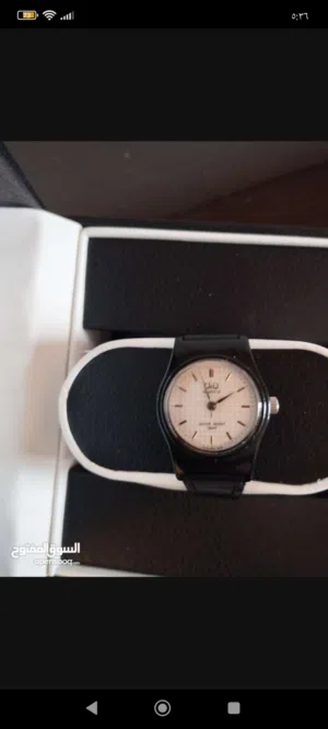 ساعة نسائية كوارتز أصلية سوداء من الخارج و بيضاء من الداخل بحجم S عقارب ضد الماء 100%