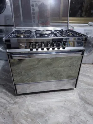 غاز يونفيرسال إيطالي مجدد كامل 5 عيون بيشتغل فرن مزدوج  او كل شوايه لحال  قياس 90 سم