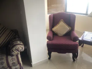 Used living room furniture in good condition consisting of three seater and two seater plus two chai