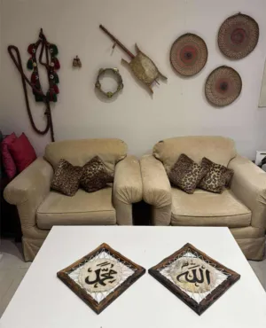 لوحتان تراثيتان بخط عربي (الله – محمد) على جلد طبيعي مشدود على إطار خشبي