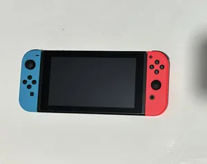 Nintendo switch v2 with all its stuff plus case, 32 extra gb (sd card) and Mario kart!