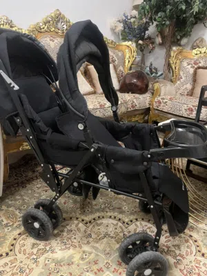 عربة أطفال شخصين