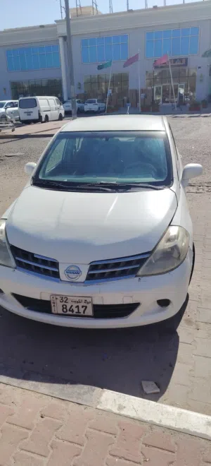 Used 2009 Nissan Tiida Sedan with Front Sensors and Air Conditioning in White