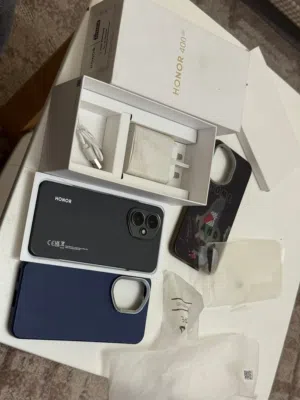 Honor 400 5g 12Ram 512g الجهاز ما فيه ولا أي غلطه مع كرتونية وعظمة الشاحن  100 w
