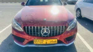 مرسيدس بنز الفئة-C 2016 - صالون سيدان أحمر مع تأمين شامل وميزات عالية الجودة