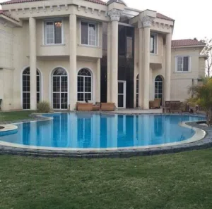 منزل دورين للبيع بطريق السور استثماري شارع 12 متر. 750000 ألف