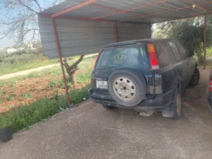 هوندا CR-V 2000 مستعملة بأسود، مرخصة ومجمركة، مع مواصفات أمريكية وميزات حديثة